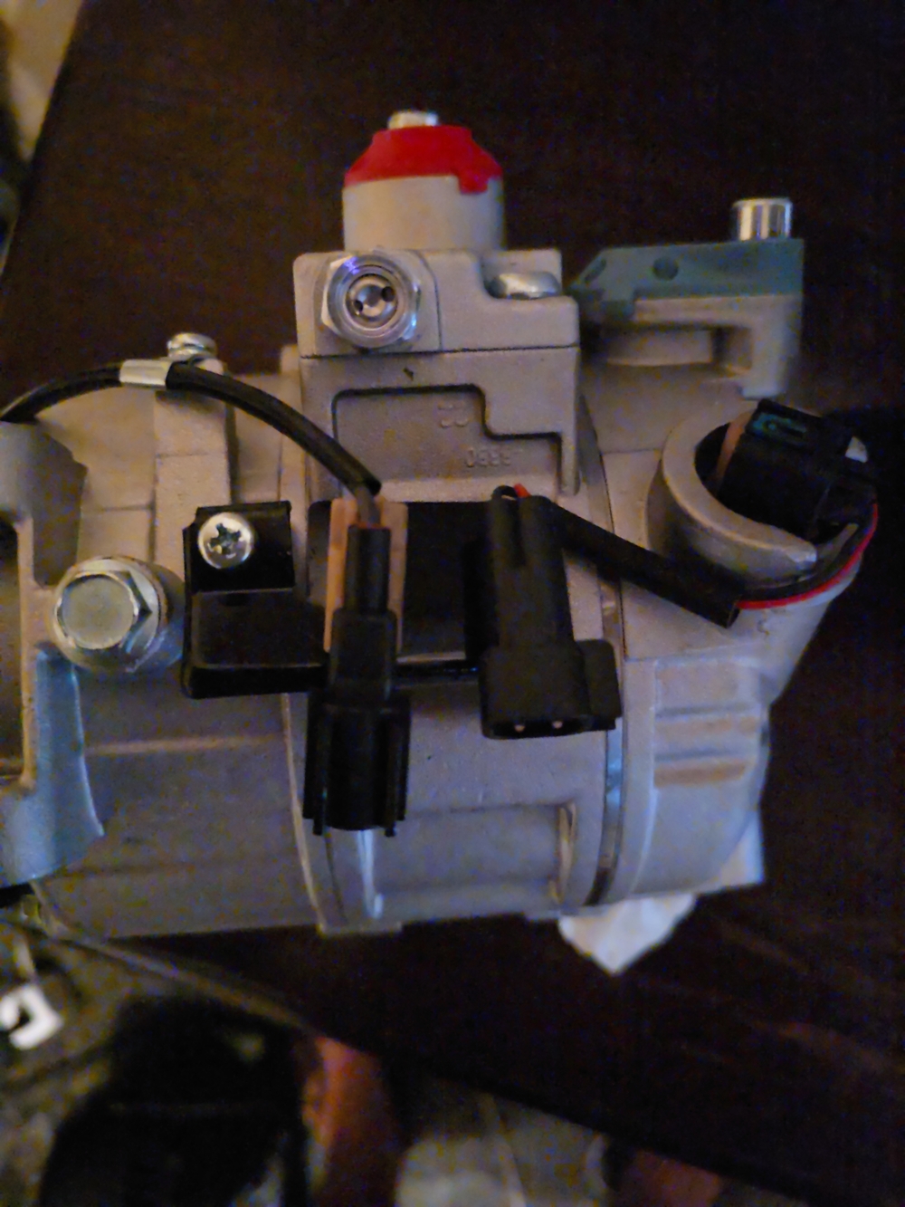 Silver Automotive Air Conditioning Compressor with Black Connectors